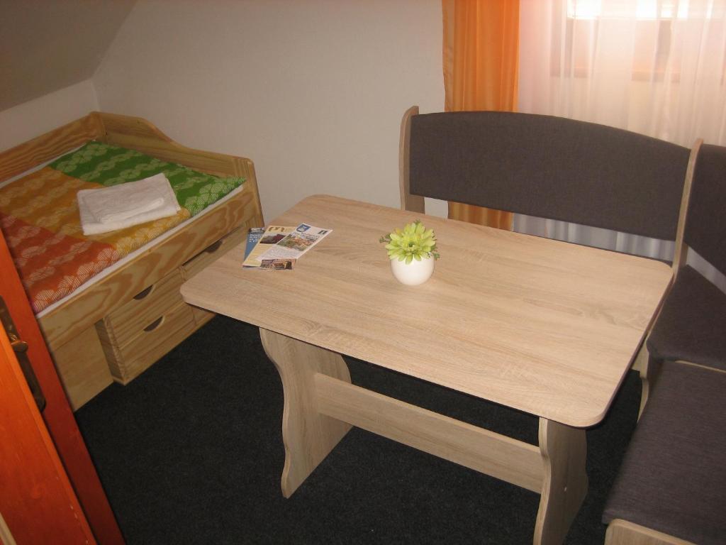Postel nebo postele na pokoji v ubytování Penzion Ryba