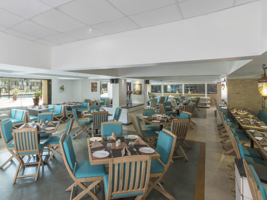 Restaurace v ubytování GCC Hotel and Club