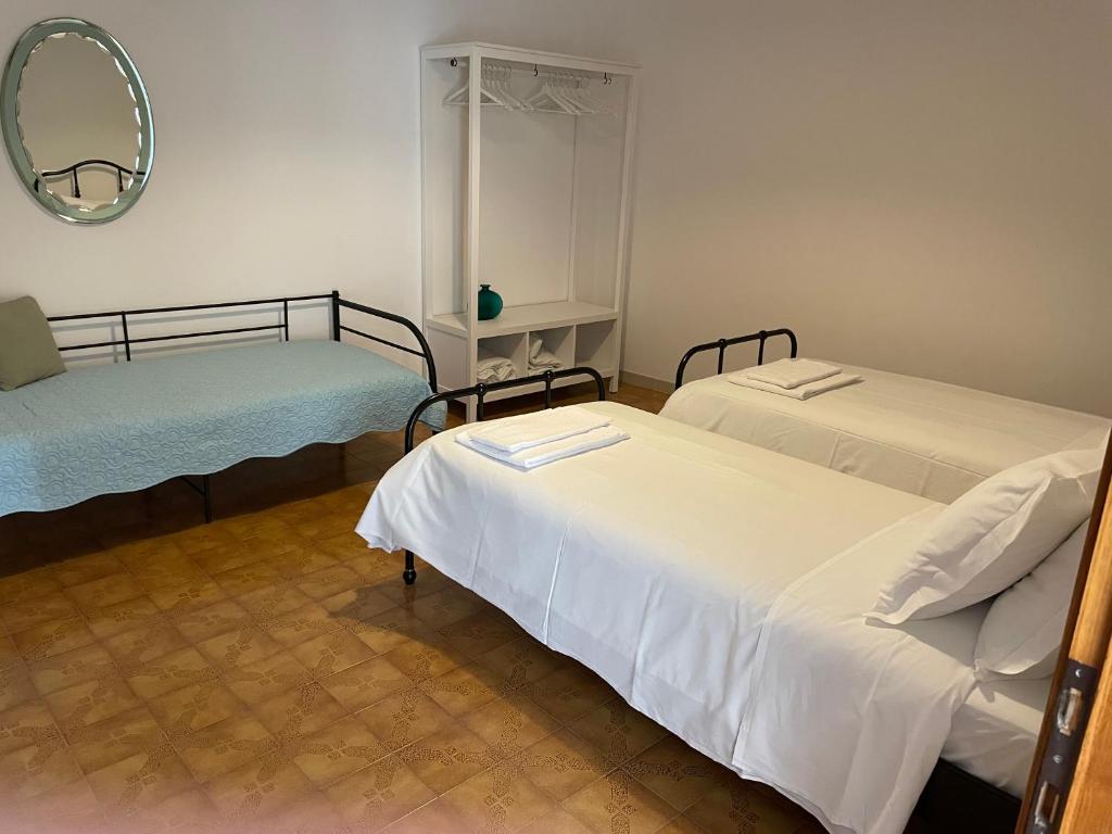 Posteľ alebo postele v izbe v ubytovaní B&B La Loccaia