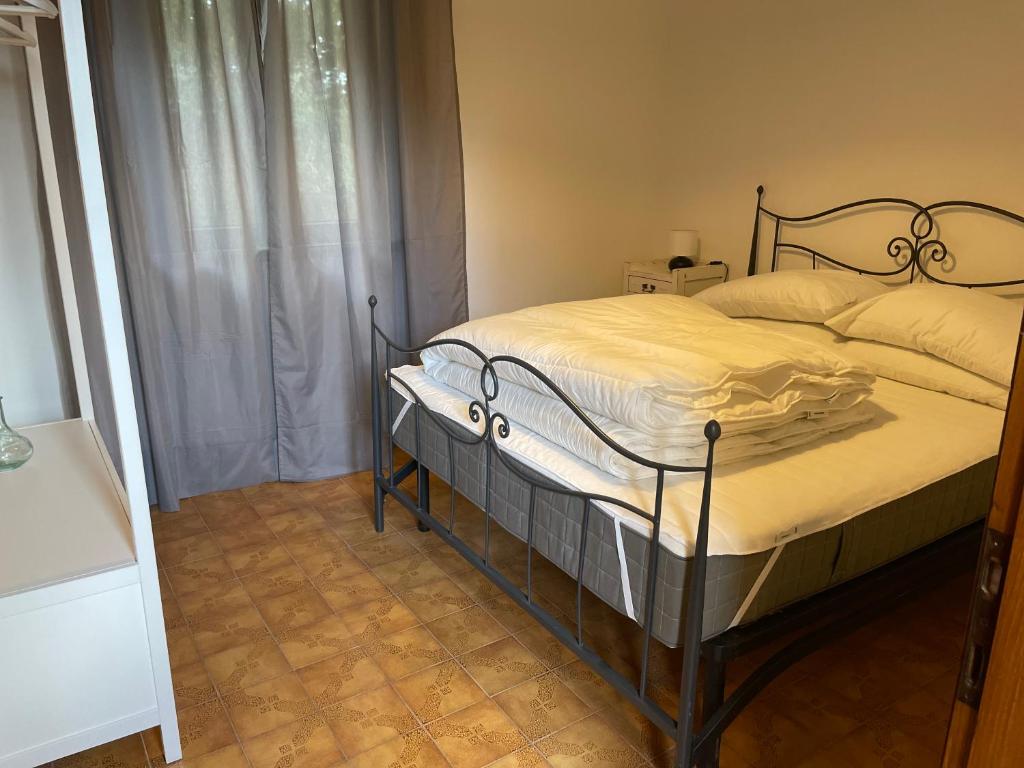Posteľ alebo postele v izbe v ubytovaní B&B La Loccaia