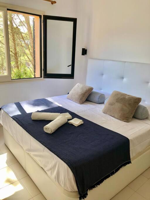 Postel nebo postele na pokoji v ubytování Casa ASIA. Relax a 5 minutos de las calas TOP.