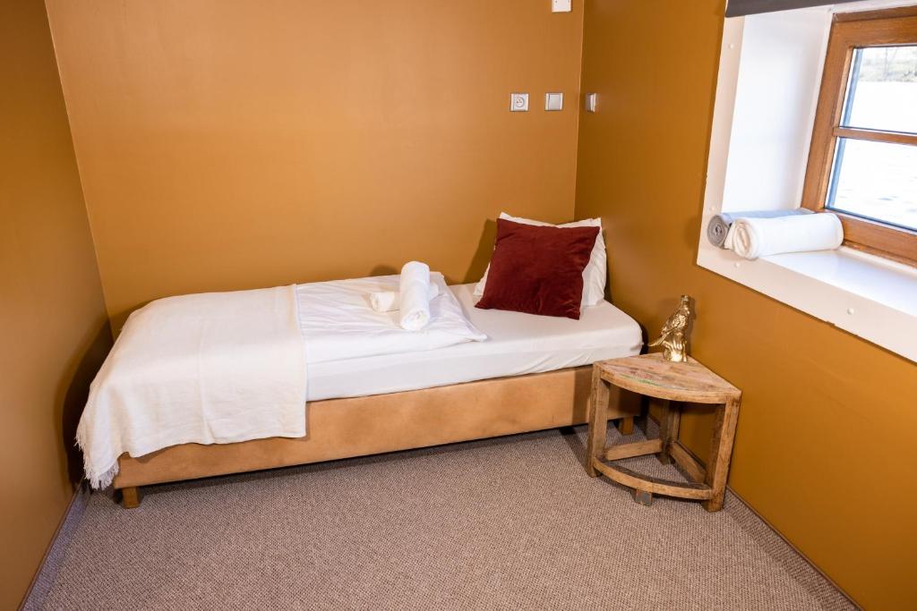 Postel nebo postele na pokoji v ubytování Botel Marina