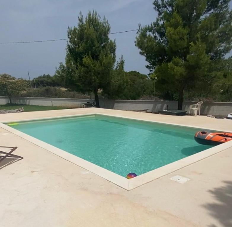 The swimming pool at or close to I Giardini Dell'Agave