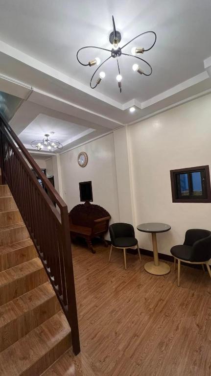 TV a/nebo společenská místnost v ubytování Sonora's Inn, Coron