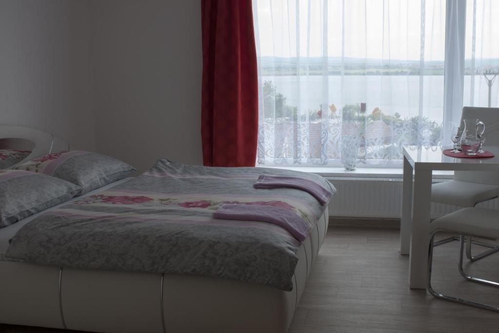 Postel nebo postele na pokoji v ubytování Ubytování Pálavská Riviéra