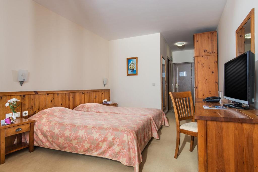 TV a/nebo společenská místnost v ubytování Mura Hotel