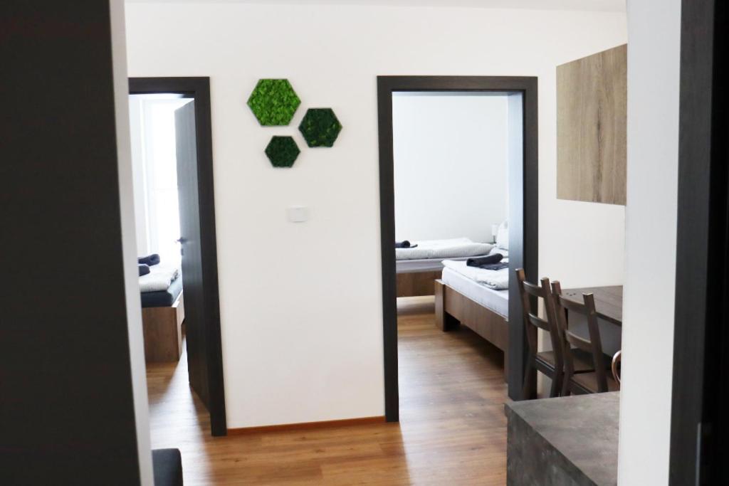 Postel nebo postele na pokoji v ubytování Apartmán Milbach