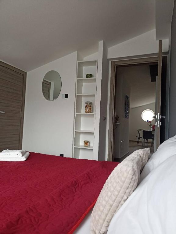 Postel nebo postele na pokoji v ubytování Attico al Gallitello
