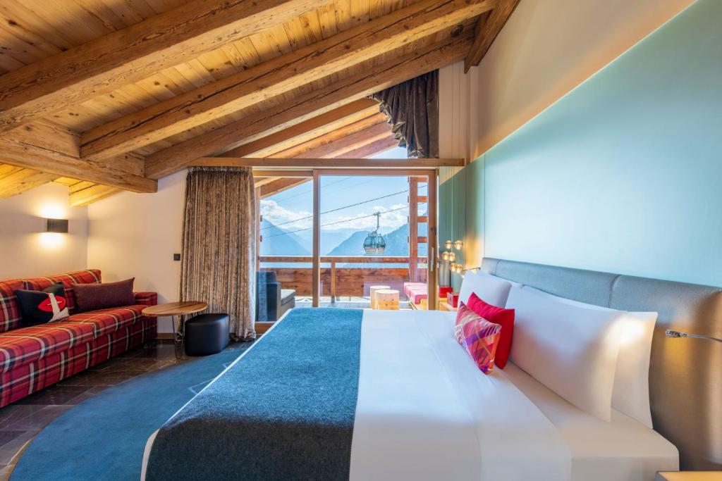 Postel nebo postele na pokoji v ubytování W Verbier