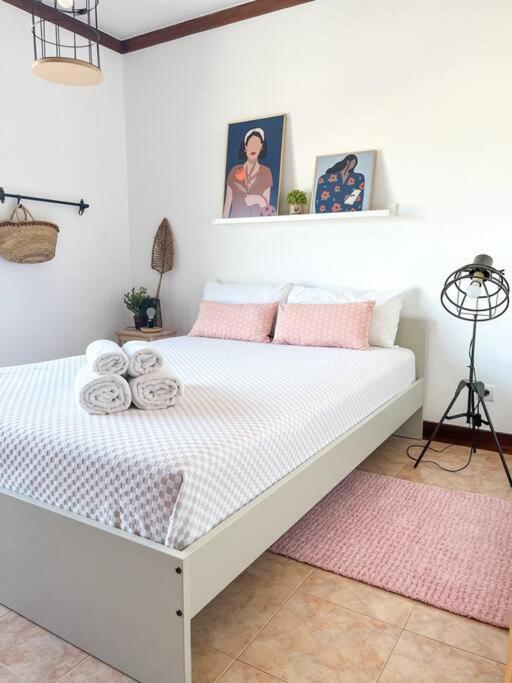 Postel nebo postele na pokoji v ubytování Esplanada-Zona Central-Perto Praias-Estacionamento Gratuito