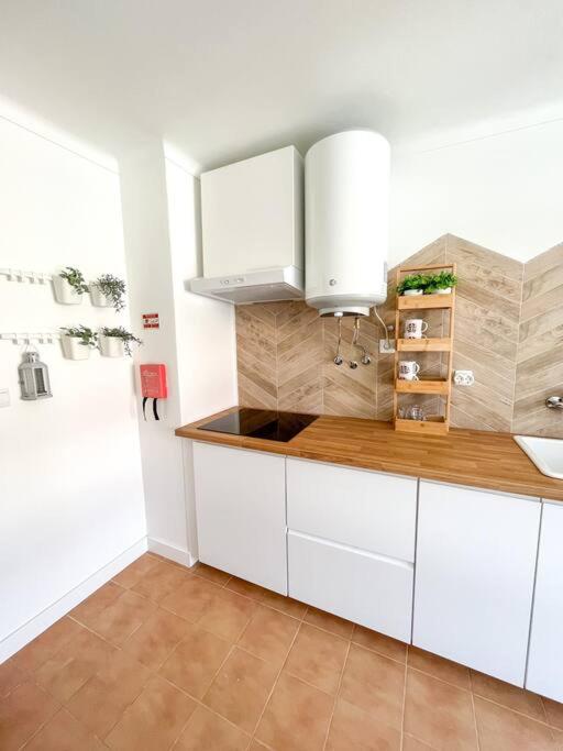 Kuchyň nebo kuchyňský kout v ubytování Esplanada-Zona Central-Perto Praias-Estacionamento Gratuito