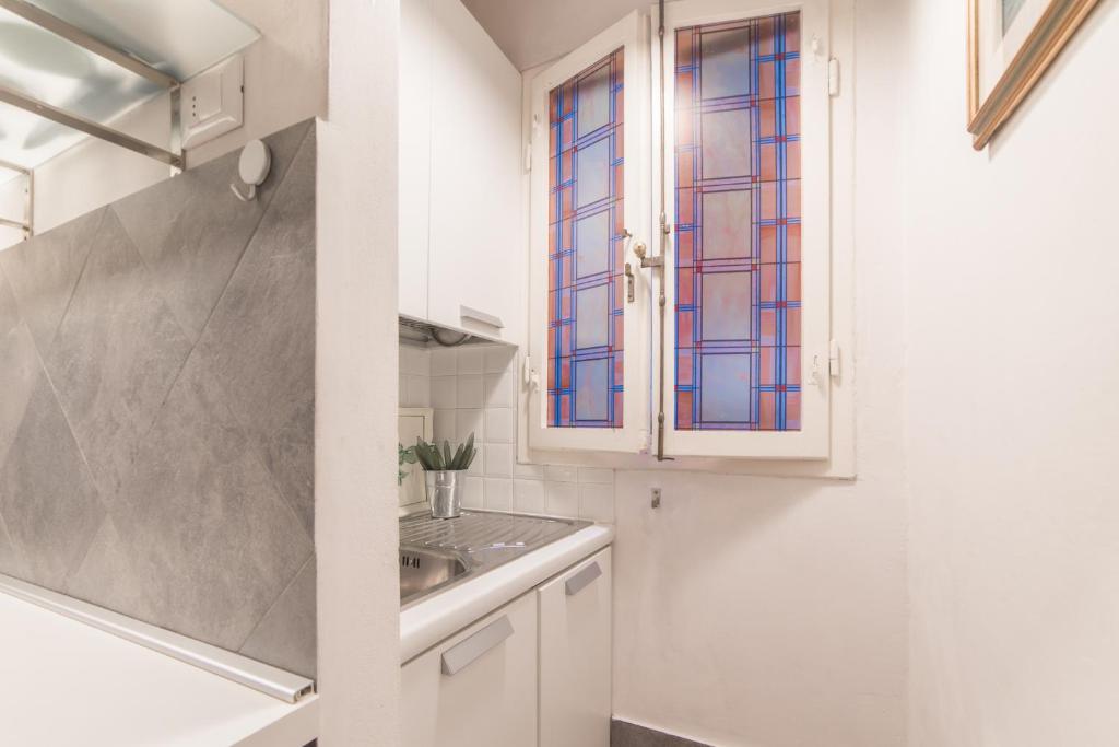 A bathroom at Pitti - Flo Apartments