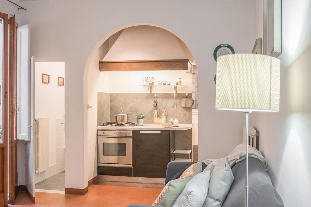 A kitchen or kitchenette at Pitti - Flo Apartments