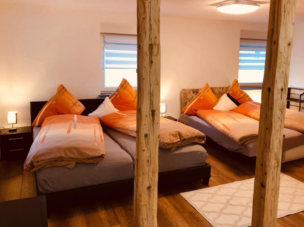 Postel nebo postele na pokoji v ubytování Ferienhaus Griede
