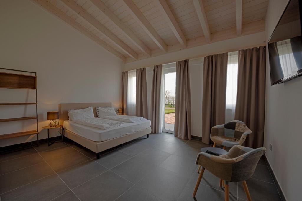 Postel nebo postele na pokoji v ubytování Agriturismo Le Tese