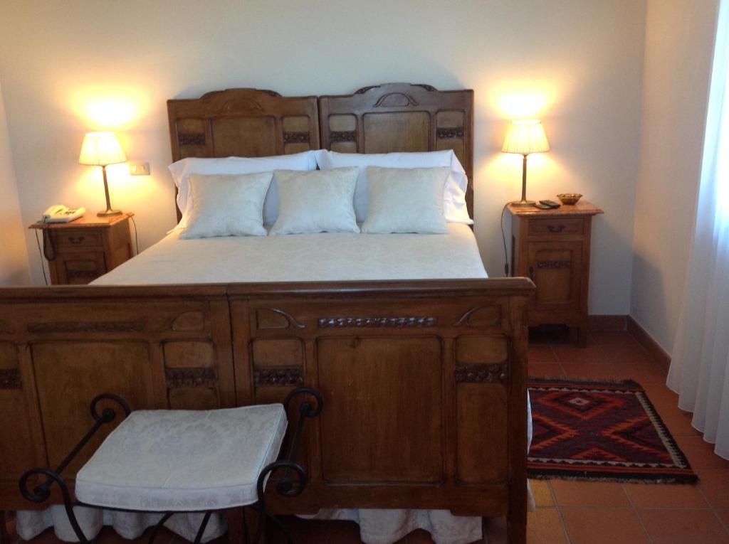 Posteľ alebo postele v izbe v ubytovaní Agriturismo La Casa in Collina