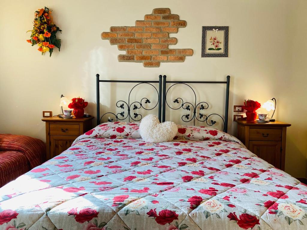 Postel nebo postele na pokoji v ubytování Agriturismo Le Tese