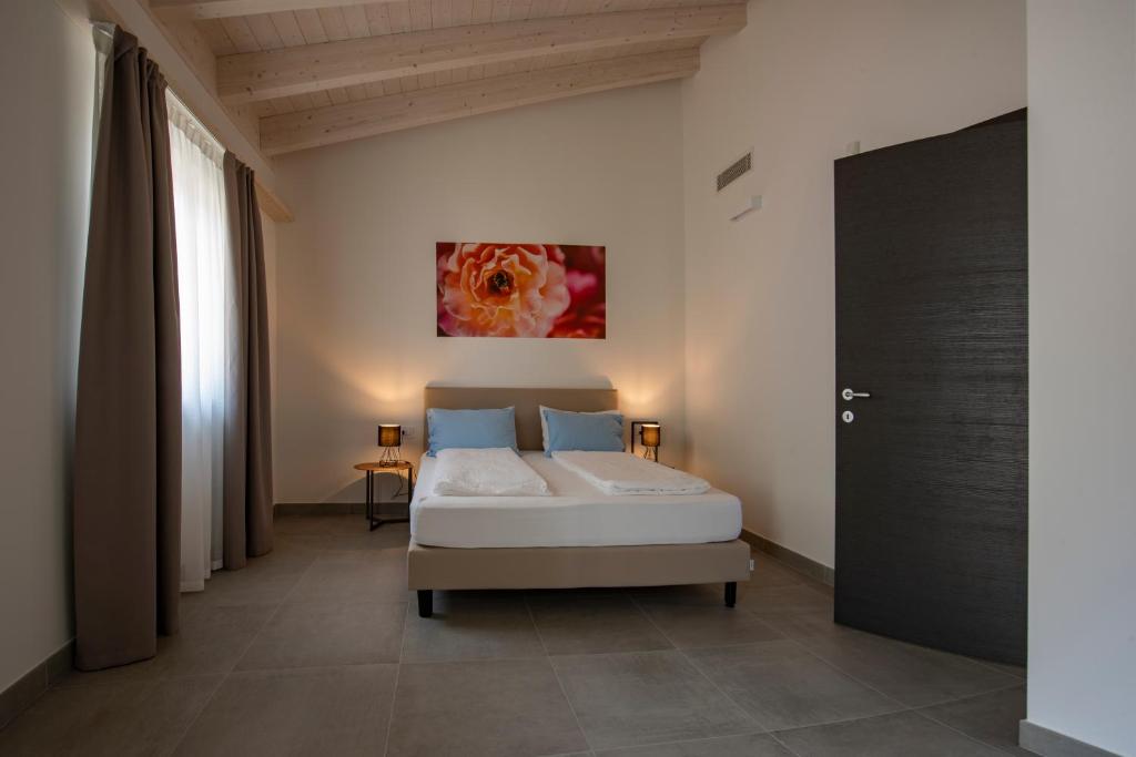 Postel nebo postele na pokoji v ubytování Agriturismo Le Tese