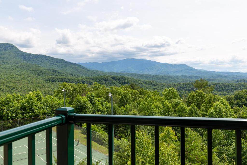 a view of the mountains from the balcony of a house at Deer Ridge Mountain Resort E208 in Gatlinburg