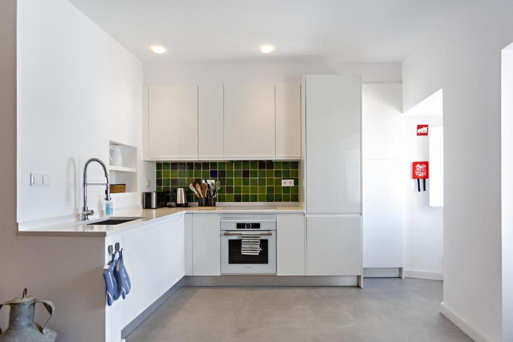 Kuchyň nebo kuchyňský kout v ubytování Casa da Tavira
