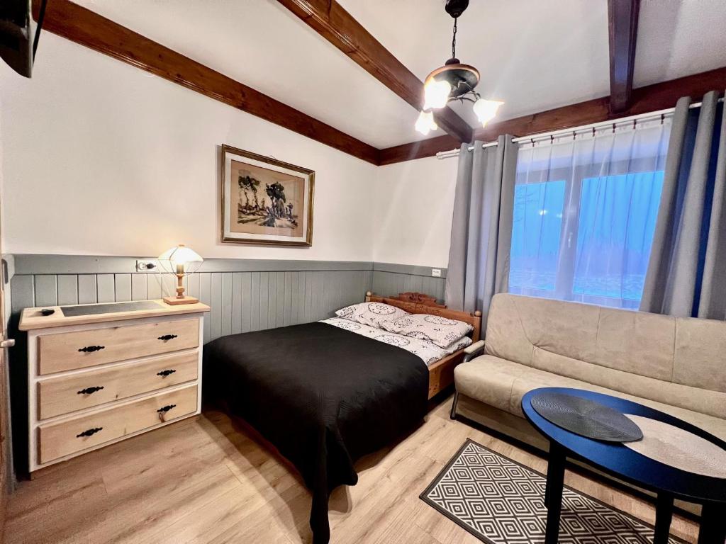 Postel nebo postele na pokoji v ubytování Villa Tatrydom