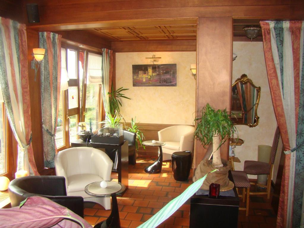 Posezení v ubytování Hôtel Restaurant N 4
