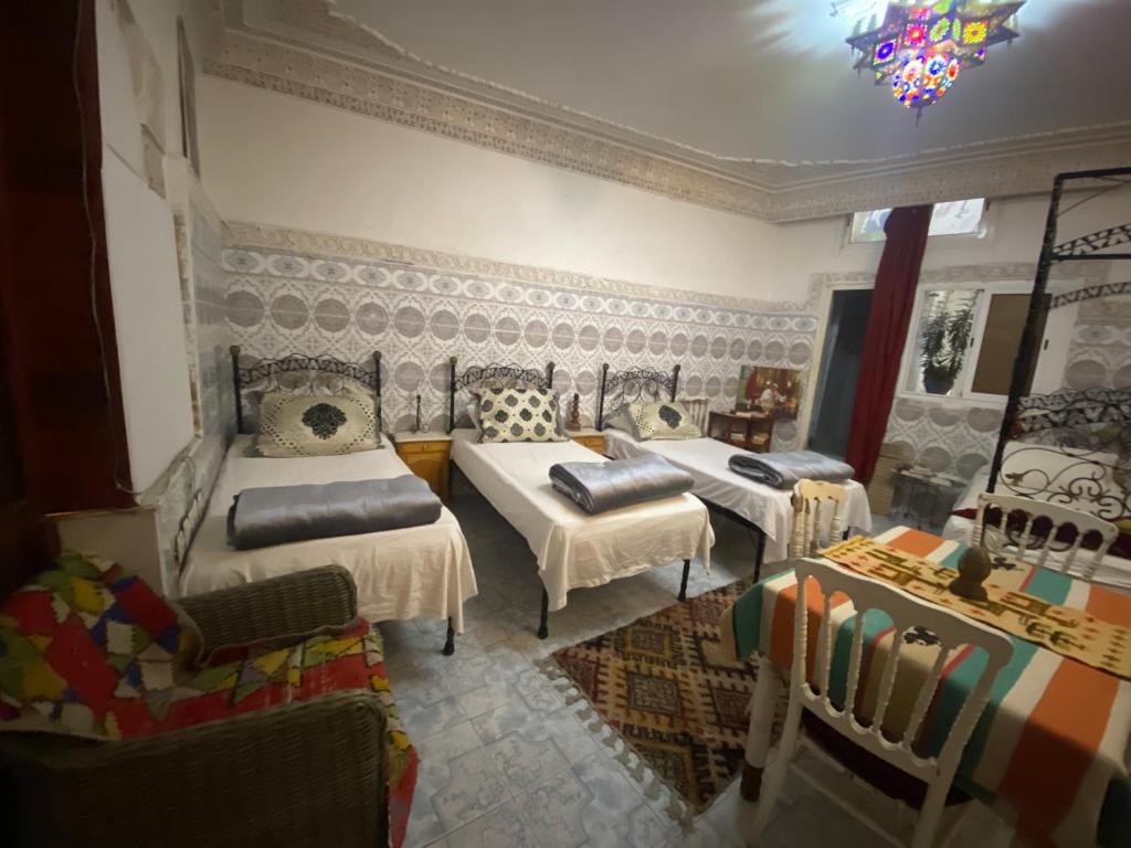 Postel nebo postele na pokoji v ubytování Fes Hostel Home