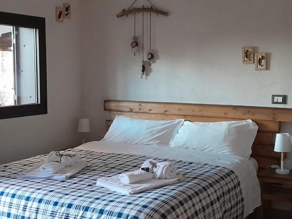 Postel nebo postele na pokoji v ubytování Etna Country Home