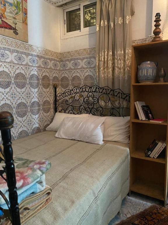 Postel nebo postele na pokoji v ubytování Fes Hostel Home
