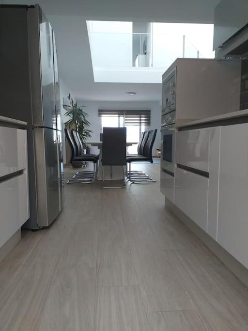 A kitchen or kitchenette at New luxury villa with jacuzzi in heart of Lanzarote