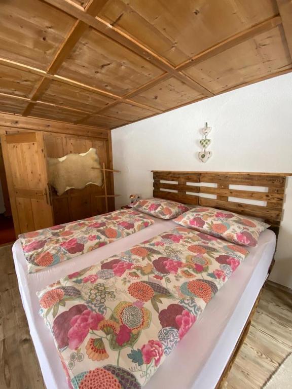 Postel nebo postele na pokoji v ubytování Gästehaus Hoamat'l