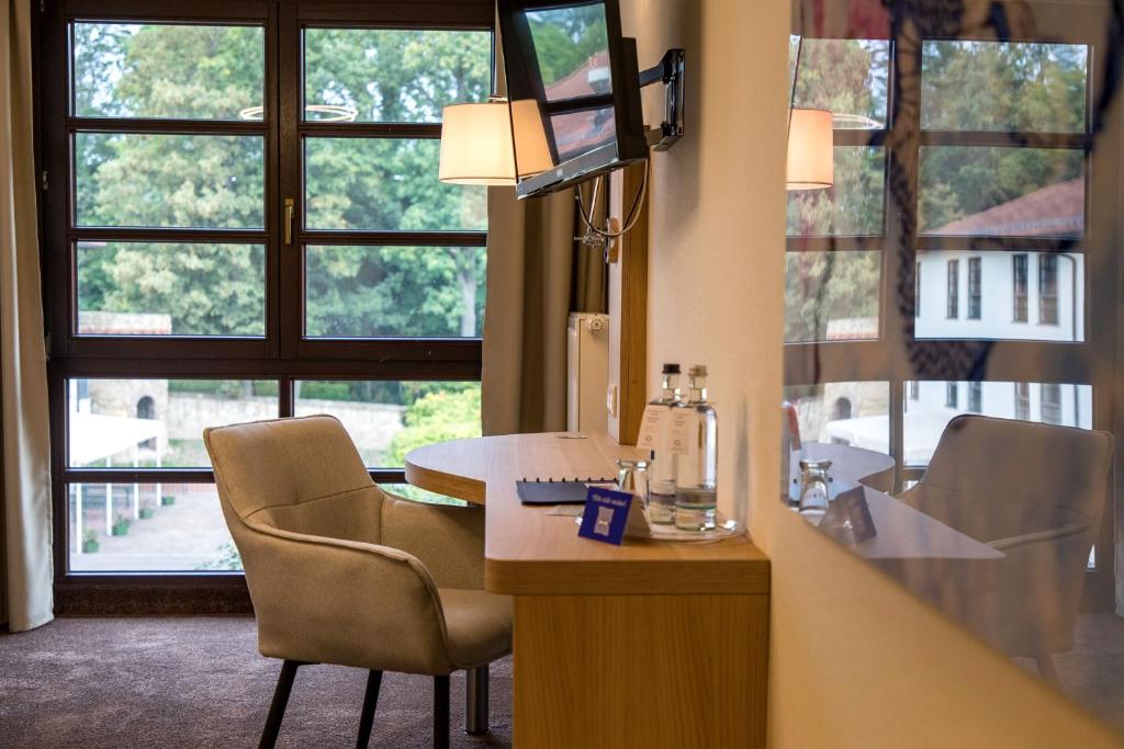 TV a/nebo společenská místnost v ubytování Kim Hotel Im Park