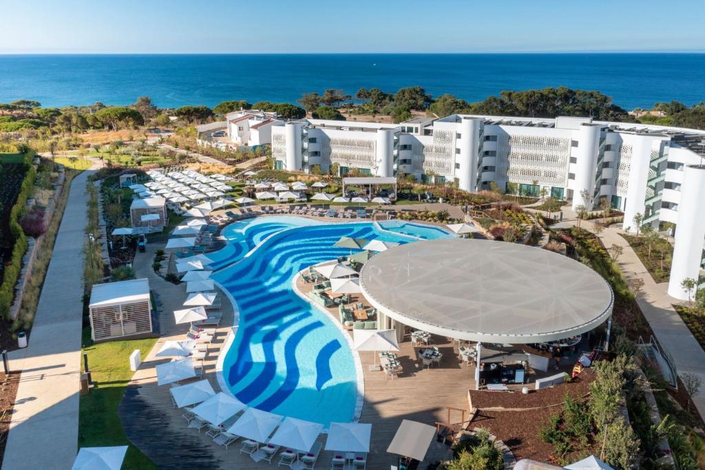 an aerial view of a resort with a swimming pool at W Algarve in Albufeira