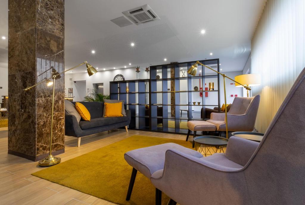Uma área de estar em In Gold Hotel & Spa