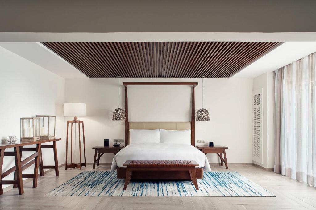 Postel nebo postele na pokoji v ubytování JW Marriott Cancun Resort & Spa