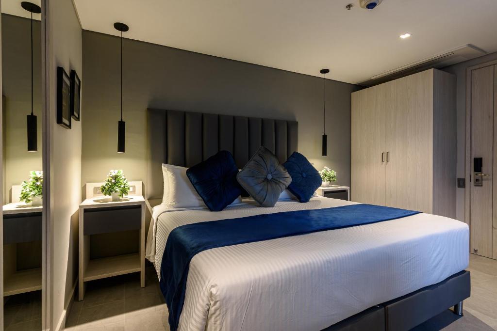 Postel nebo postele na pokoji v ubytování 4 Sur Hotel