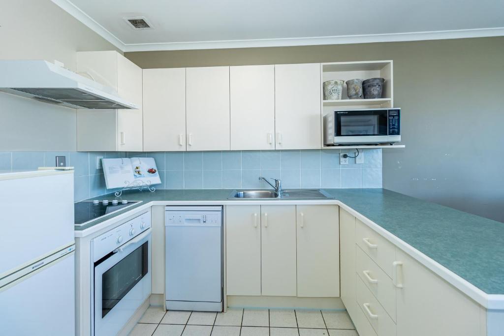 Kuchyň nebo kuchyňský kout v ubytování Sunny Apartment Methven