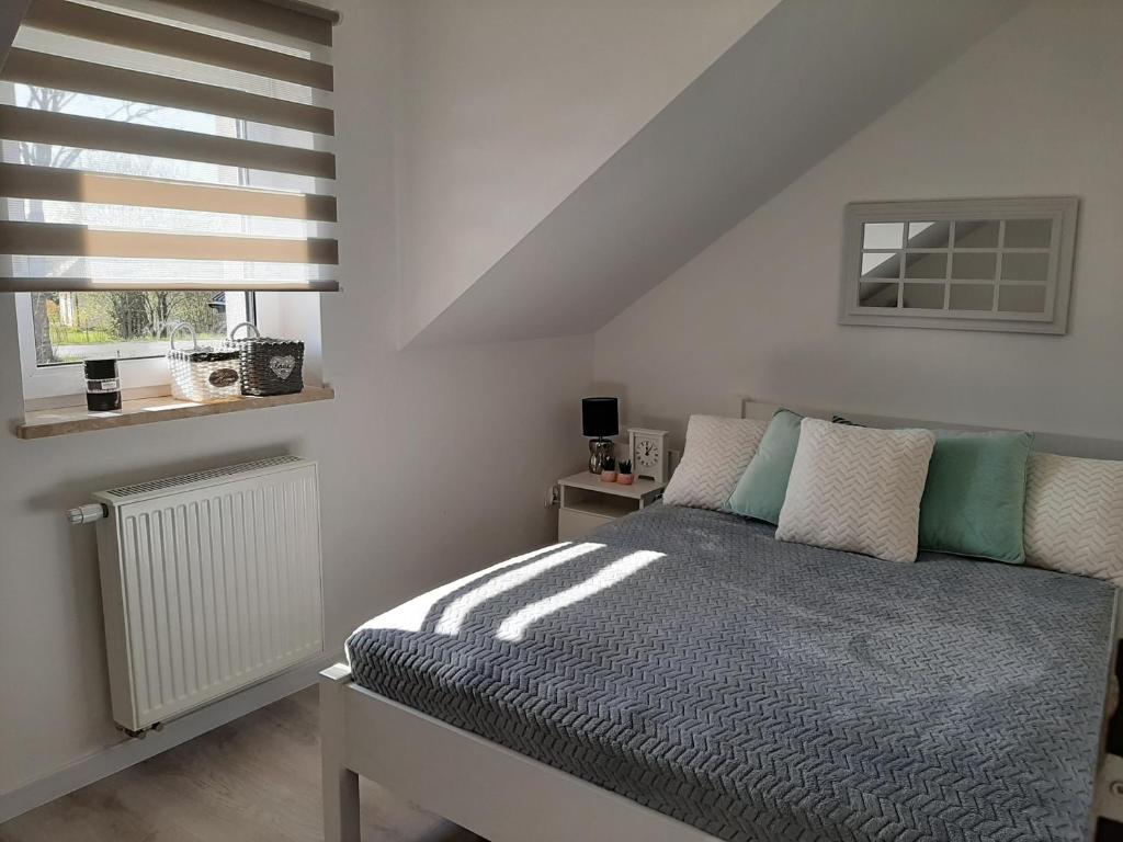 Postel nebo postele na pokoji v ubytování Apartamenty Sol Mare