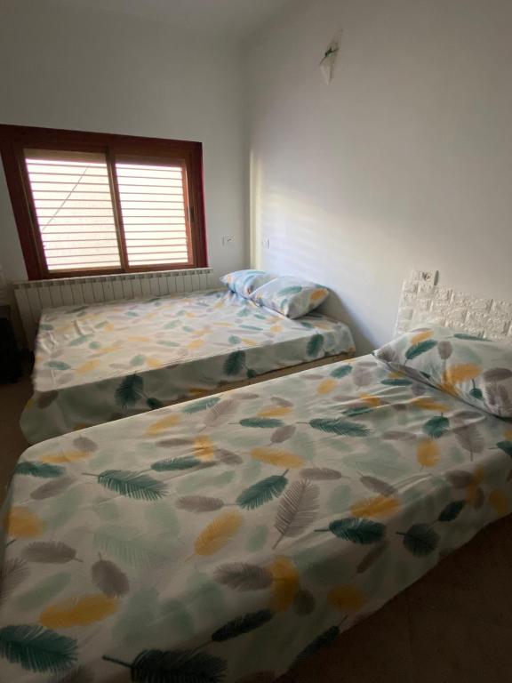 Ліжко або ліжка в номері B&B סהרת חוב