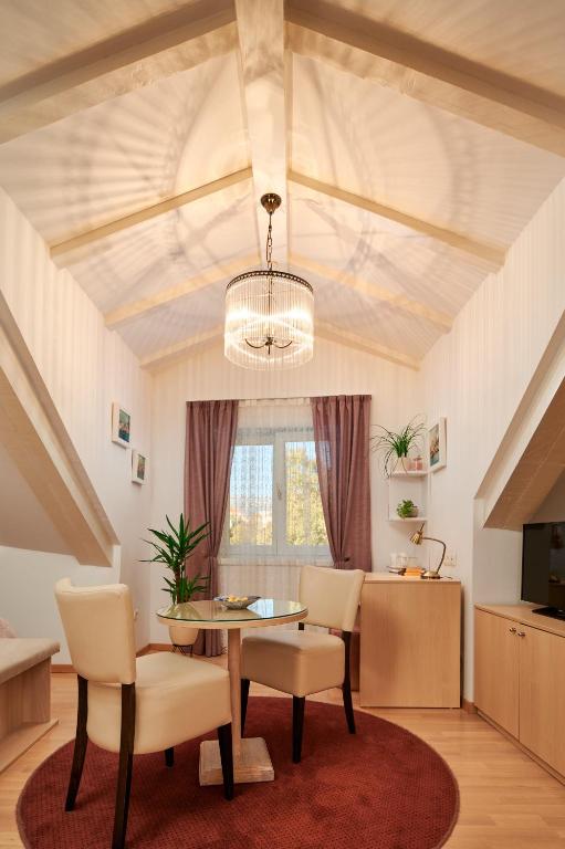 TV a/nebo společenská místnost v ubytování Lanterna Rooms