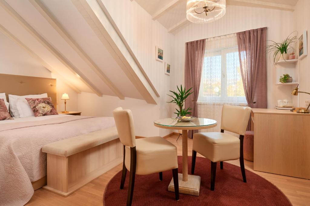 Postel nebo postele na pokoji v ubytování Lanterna Rooms