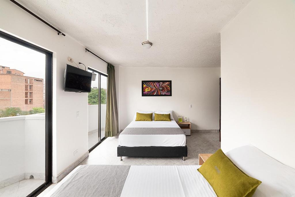 Postel nebo postele na pokoji v ubytování Hotel Balcones del Estadio