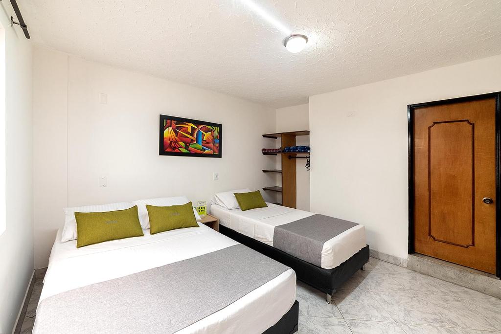 Postel nebo postele na pokoji v ubytování Hotel Balcones del Estadio