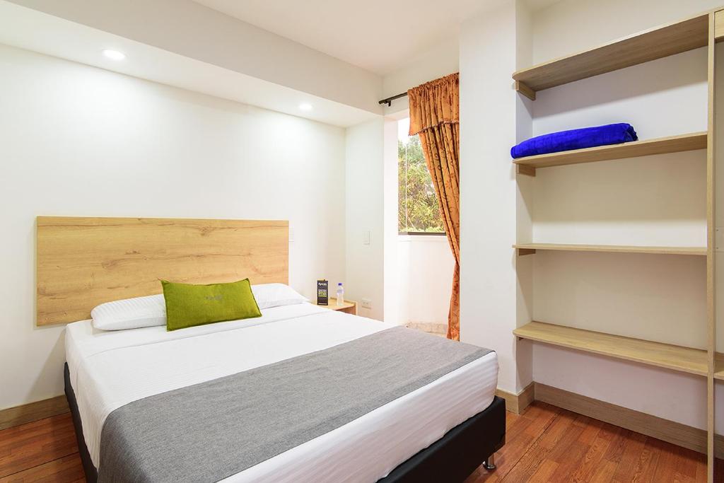 Postel nebo postele na pokoji v ubytování Hotel Balcones del Estadio