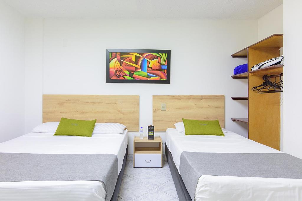 Postel nebo postele na pokoji v ubytování Hotel Balcones del Estadio