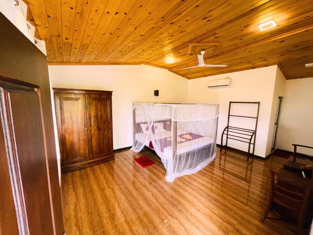 Postel nebo postele na pokoji v ubytování Shan Star Weligama