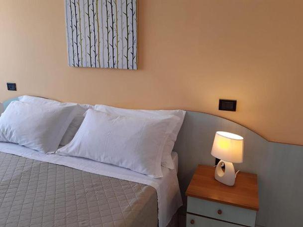 Postel nebo postele na pokoji v ubytování Hotel La Plancia
