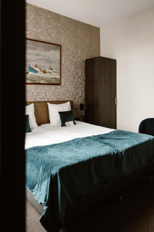 Postel nebo postele na pokoji v ubytování Hotel Amerika