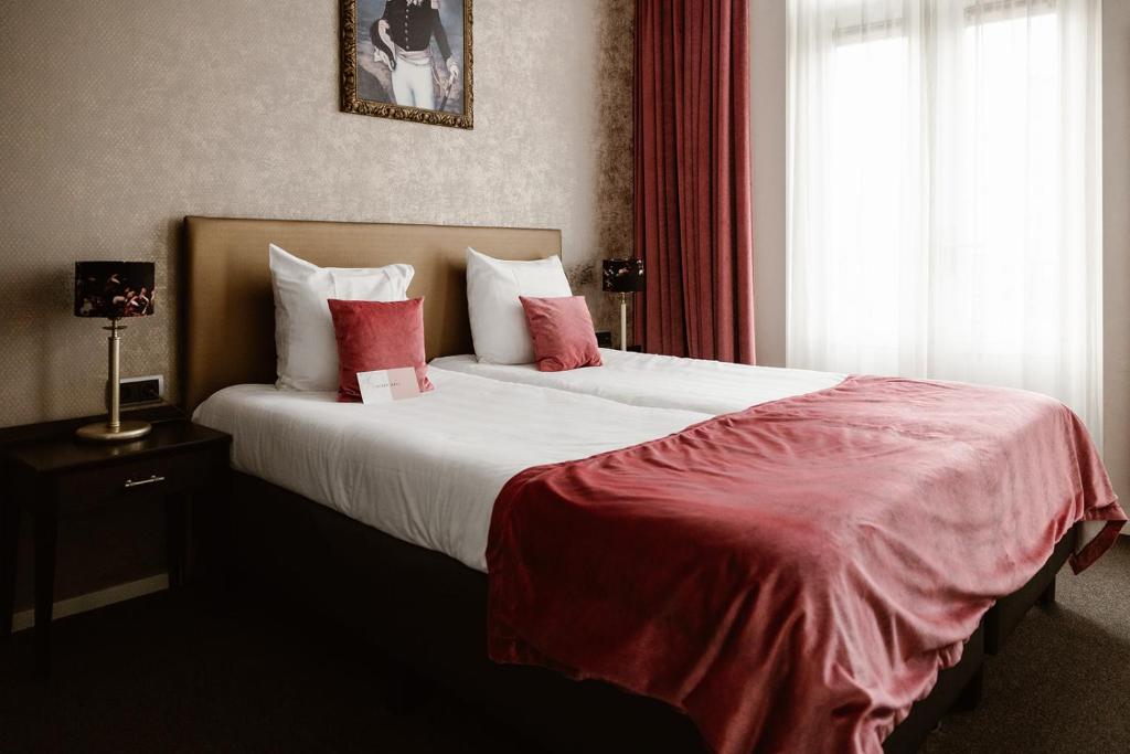 Postel nebo postele na pokoji v ubytování Hotel Amerika