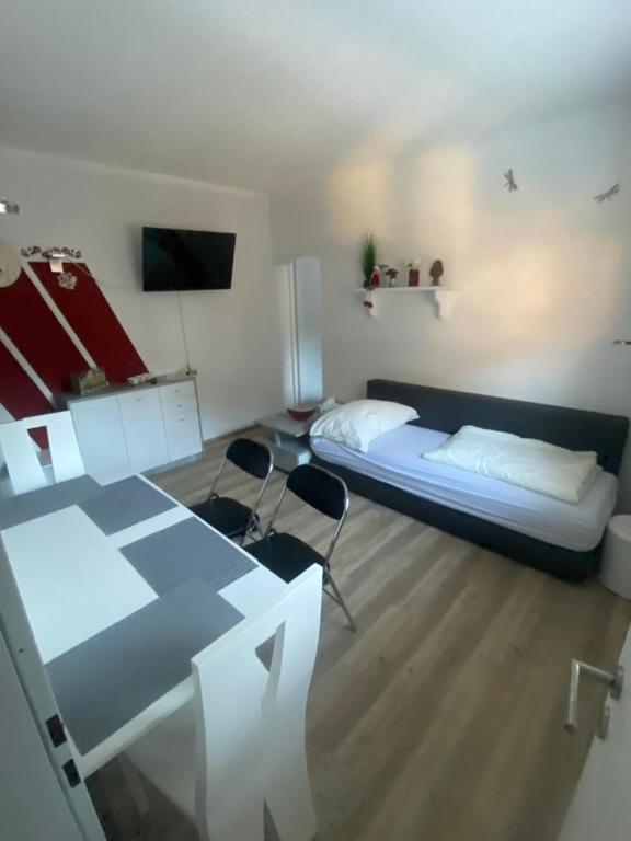 TV a/nebo společenská místnost v ubytování NOCK - Zentrum Appartement